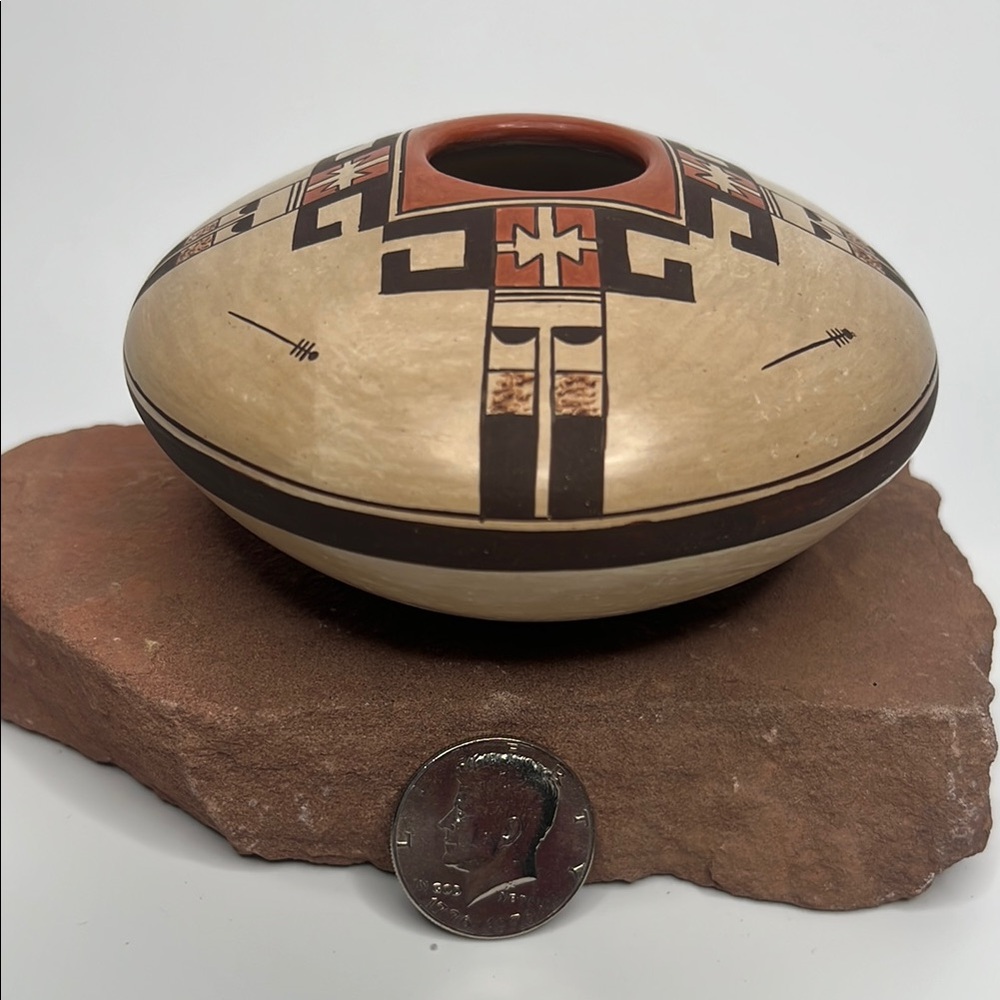 Handcrafted pottery bowl with Tribal Design.